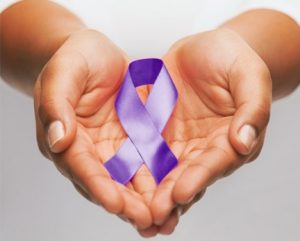 abuse purple abuse ribbon in hands