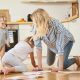 A mother plays with her kids after divorce.